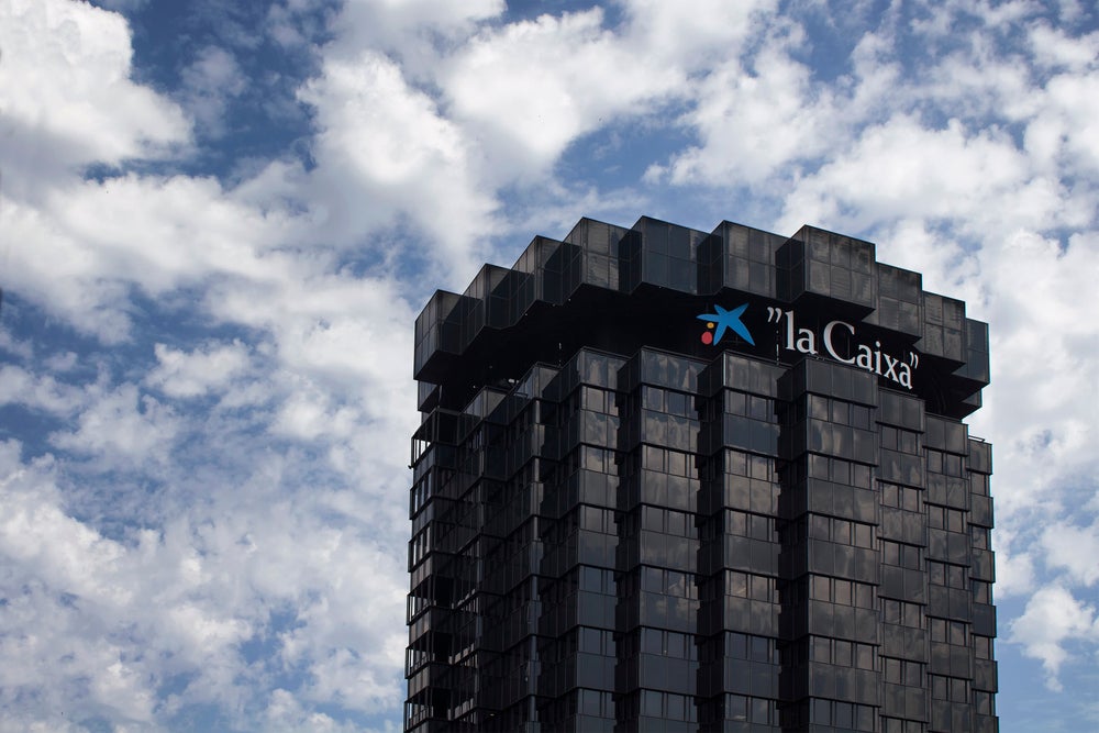 Spain's Caixabank in tie-up with BNP Paribas 3 Step IT